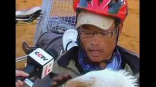 preview picture of video 'One stray dog's incredible journey with Chinese cyclists'