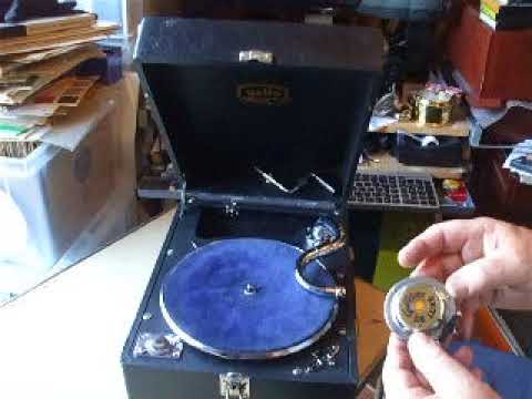 "The Squire Demonstrates a Gallotone "Gallo Ace" Portable  Gramophone
