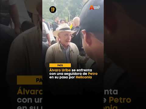 Álvaro Uribe se enfrenta con una seguidora de Petro en su paso por Heliconia
