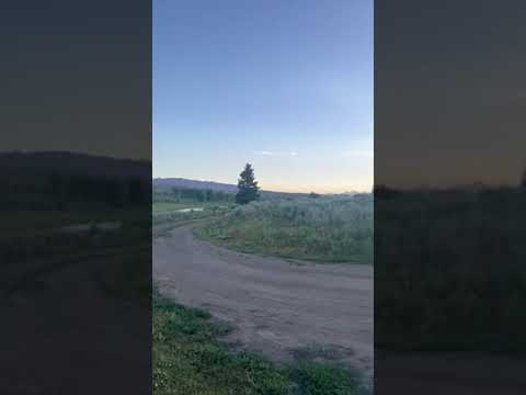 views from our campsite (fire pit, river, TETONS!)