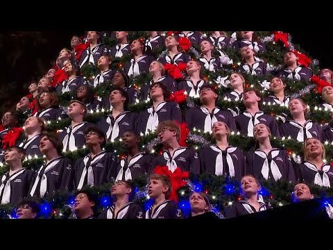 Video Thumbnail: A choir inside a giant Christmas tree in the USA