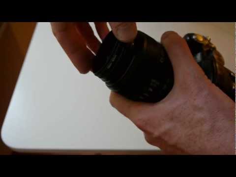 Attaching a reversed normal lens in front of a tele zoom lens for macro use
