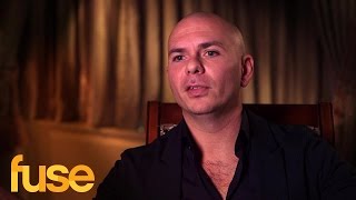 Pitbull Reflects On SLAM Charter School