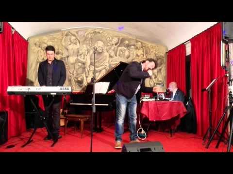 BATTISTI LIVE -VITTORIO PIANOBAR-FRAMMENTI DEL CONCERTO 2