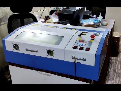 Mini CO2 Laser Engraving And Cutting Machine