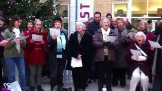 Jason Manford sings Silent Night at York Station with the Action Aid choir