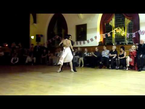  Claire da Silva  and  Dario da Silva  are  dancing  to  a  tango  at  England International Tango Festival  in  2012