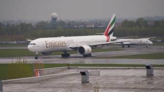 Boeing 777 Emirates EPWA Wet runway take off.