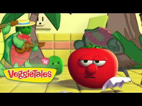 Red tomato character with a sad, tired expression sits on a yellow-tiled floor, a guitar-playing green veggie in a straw hat behind, VeggieTales logo in the corner.