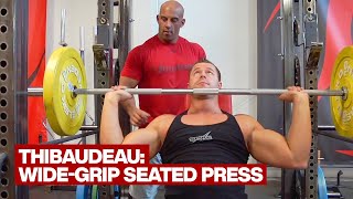Wide Grip Seated Overhead Press exercise video thumbnail