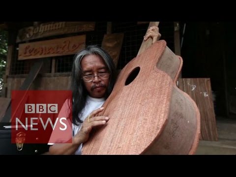 Myanmar man makes guitars from Cyclone Nargis wood - BBC News