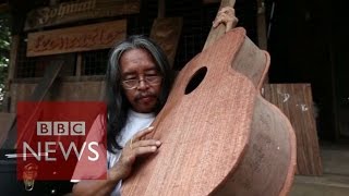 Myanmar man makes guitars from Cyclone Nargis wood - BBC News