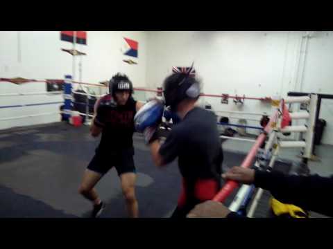 First day sparing. The tall fighter is the one I am training.