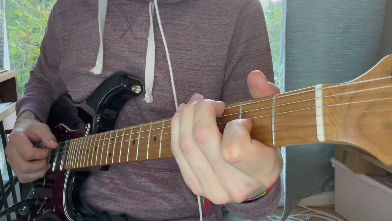 Roberto Barlocci playing Behind Blue Eyes fingerstyle on guitar