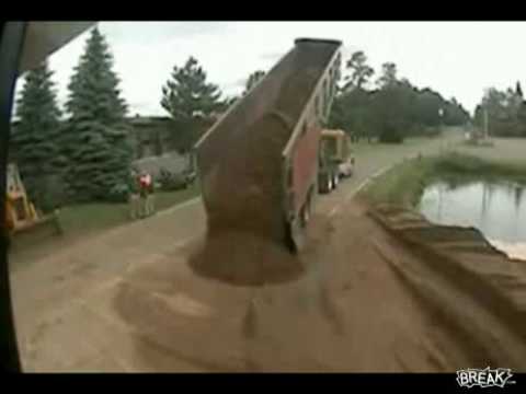 Dumb Driver Tips Over Dump Truck‏