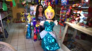 preview picture of video 'Cinderella Pinata, Candy Shop, Los Algodones, Mexico, 5 June 2013'