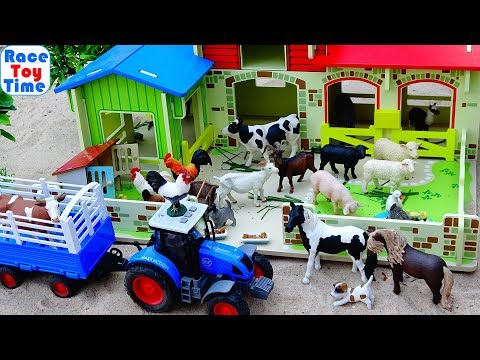 Farm Animal Toys and Barn Playset in the sandbox