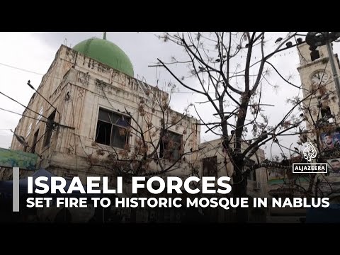 Israeli forces storm and set fire to historic mosque in Nablus amid West Bank raids