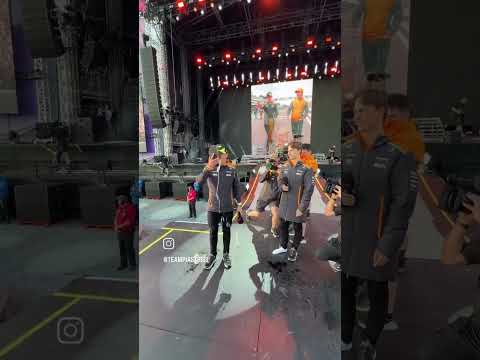 Oscar Piastri and Lando Norris doing a shoey - British Grand Prix 2024