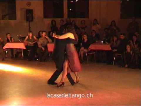  Corina de la Rosa  and  Julio Balmaceda  are  dancing  to  a  tango