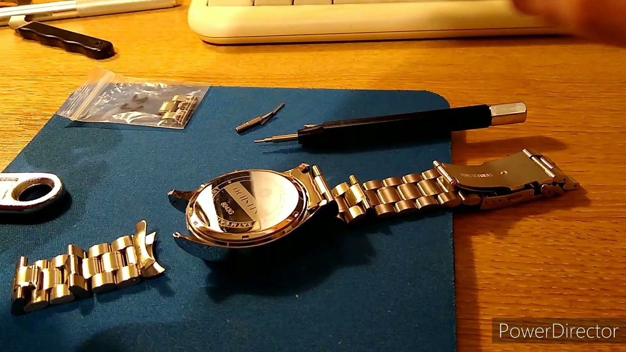Watch video Fitting a metal watch strap with curved ends. Change a leather watch strap to a stainless steel one Now Fitting a metal watch strap with curved ends. Change a leather watch strap to a stainless steel one
