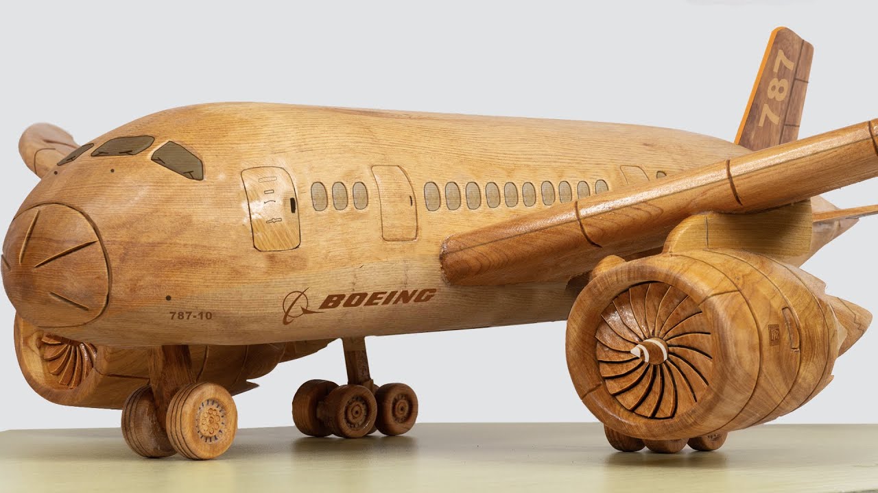 wood carving sculpture boeing 787 plane by wood world