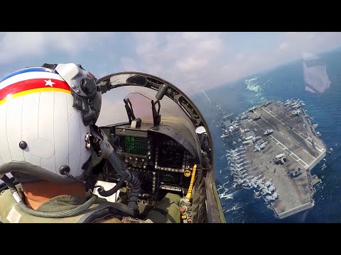 How US Navy Pilots Pull Off Scary Landings on Crowded Aircraft Carrier at Sea
