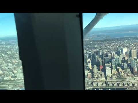 Flying orbits over Seattle downtown prior to Boeing field landing with C172.