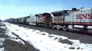 preview picture of video 'BNSF Warbonnets Cruise Through Detroit Lakes, MN, with Grain'
