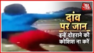 Adhbhut Akalpniye Avishwasaniye : Boy Performs Dangerous Stunt On Indian Railway