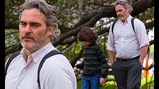Joaquin Phoenix sports slacks and a button down shirt on the set of new drama film C'mon C'mon in Lo video