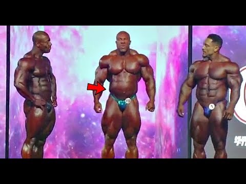 Phil Heath could not Control his Gut between poses (Video Footage)