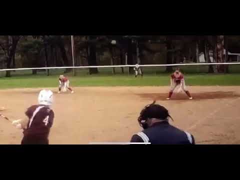 Emily Michalak using her speed and athleticism to Rob an extra base hit