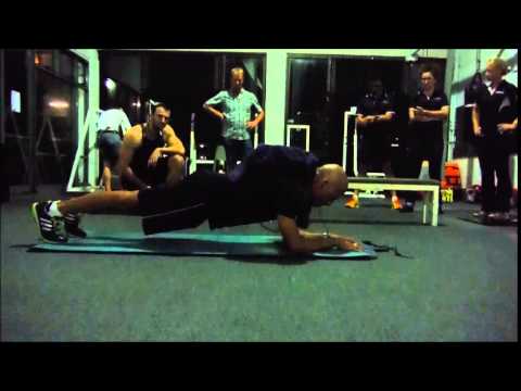 Guinness World Record for the longest time in an abdominal plank position with a 100-lb pack