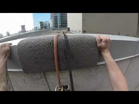 Rope access window cleaning with rigging