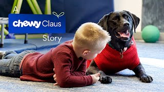 Chewy Claus Brings Joy To Children and Therapy Dog at Autism Clinic