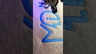 Embroidery blue fade effect close up