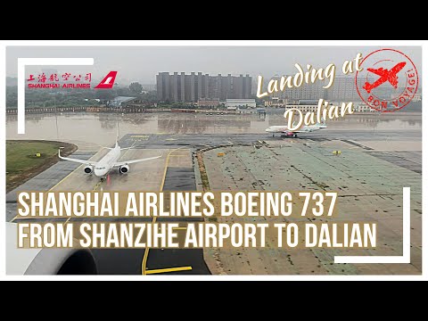 Shanghai Airlines Boeing 737 landing at Zhoushuizi International Airport (DLC - Dalian) from Rizhao