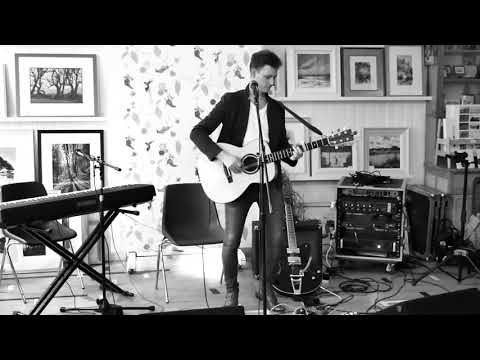 Mark W Georgsson, Scottish singer-songwriter playing "Break Free" at Braemar Gallery, July 2017