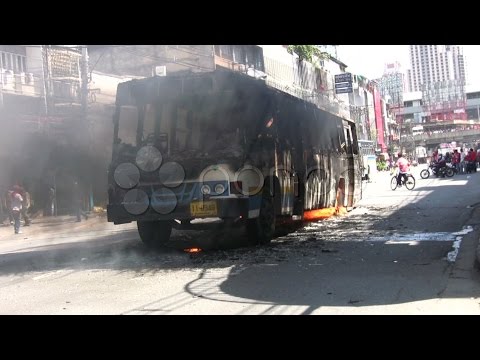 Burning Bus In Riot Street Civil War Protest Demonstration Red Shirt Thailand . Stock Footage