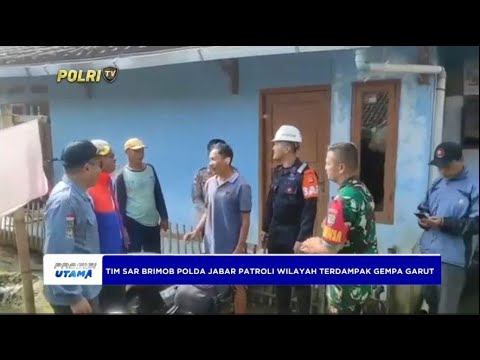 ANGGOTA BRIMOB TANGGAP BENCANA GEMPA GARUT