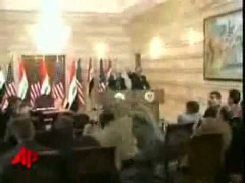 Iraqi Journalist throws shoes at President George W. Bush (Bomb Osama)