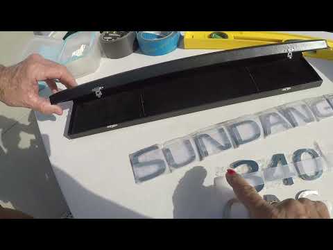 thereluctantboater.com unboxing and installing her custom made Emblems