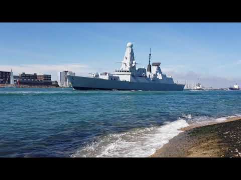 Hms Defender sailing out of HMNB Portsmouth