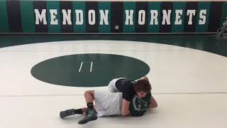 Wrestling 101: Mendon's Nik Andaverde and Skyler Crespo demonstrate a half nelson wrestling pin