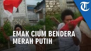 VIDEO: Fakfak Rusuh, Emak-emak Kibarkan Bendera Merah Putih dan Menciumnya di Tengah Jalan