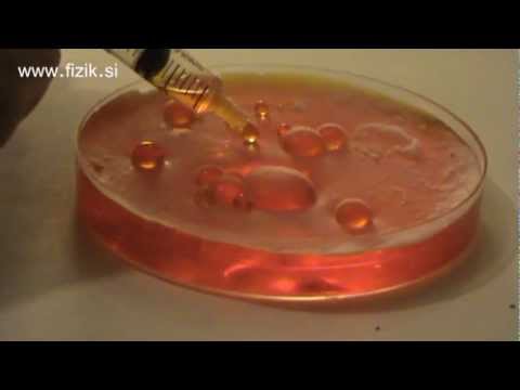 Water drops on water - Science experiment