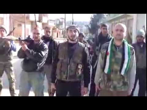 بيان يلقيه قائد كتيبة الحمزة ابراهيم محمد أيوب يعلن فيه تحرير عدة أحياء داخل مدينة الرستن في ريف حمص