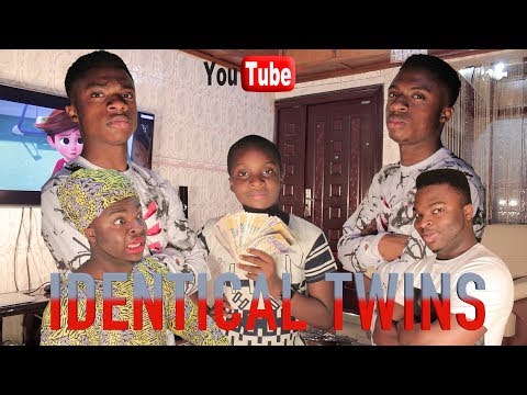 AFRICAN HOME: IDENTICAL TWINS