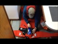Checking Immersion Suit During Coast Guard Safety Exam